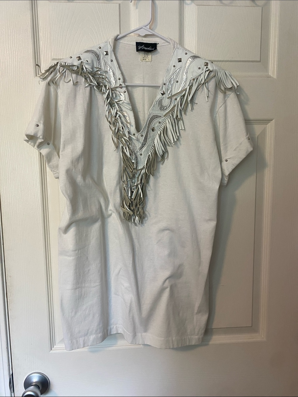 Aventura White Fringe V‑Neck Short Sleeve Tee with Stud Accents
